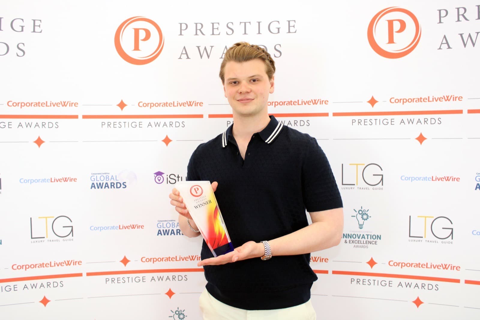 Dylan accepting a Prestige Award at the CorporateLiveWire awards ceremony