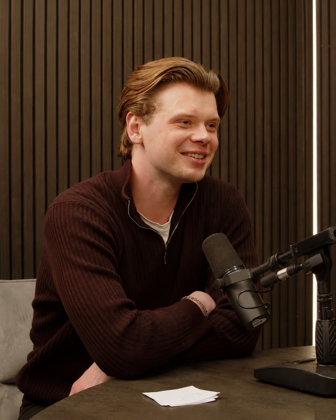 Dylan at the podcast studio during a session for PodCut