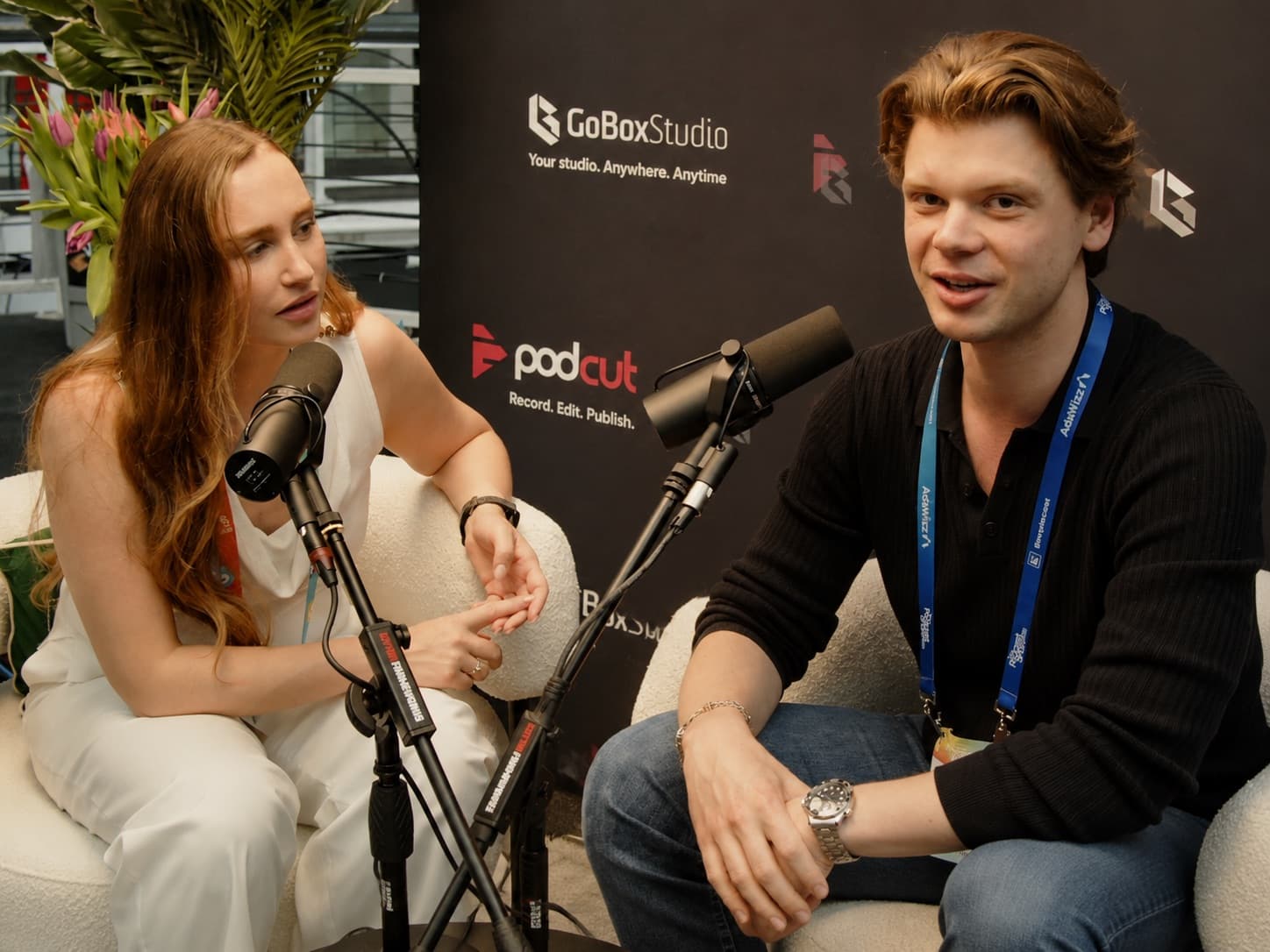 Dylan recording a podcast interview with a guest at GoBox Studio for PodCut