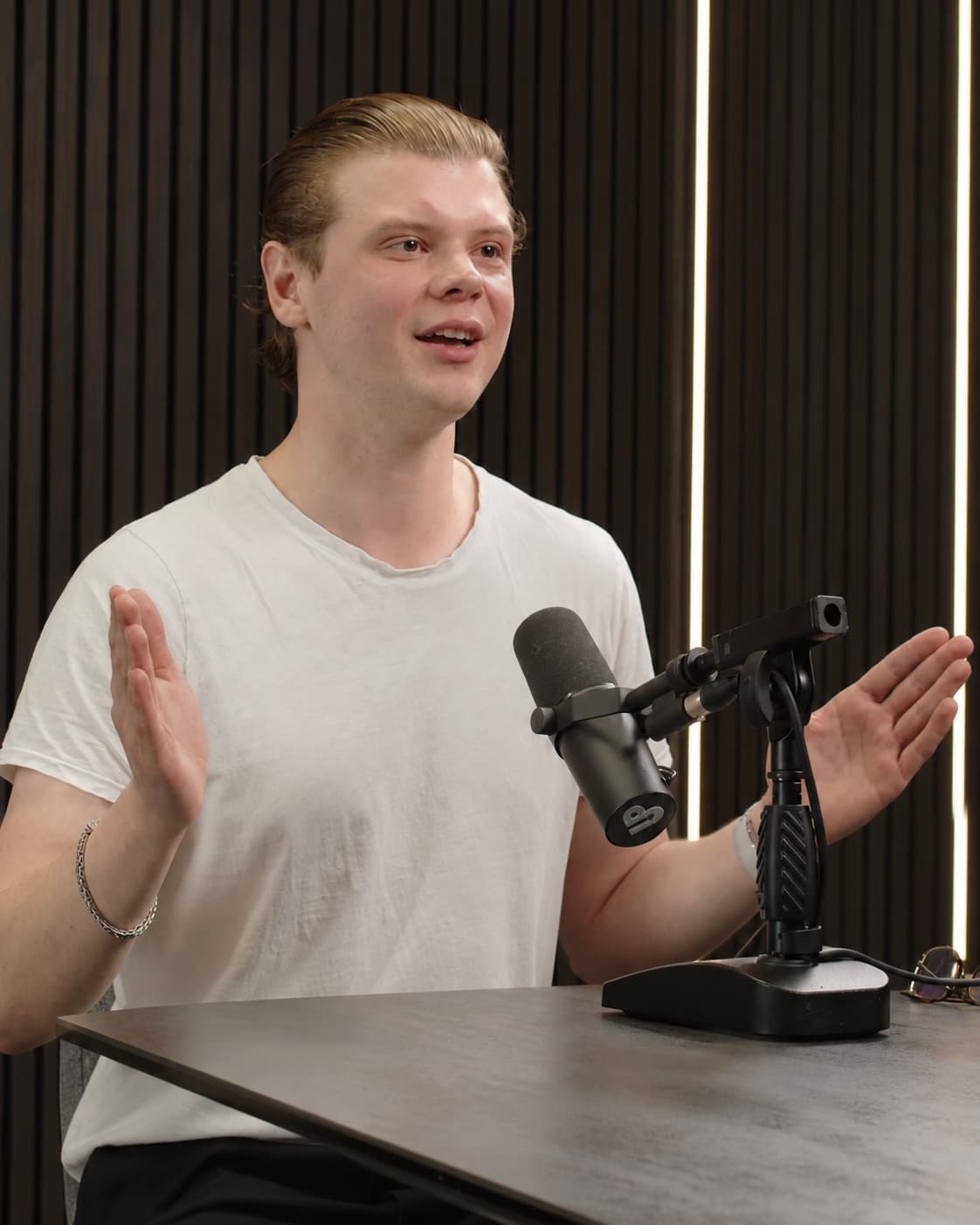 Dylan speaking during a studio recording session for the PodCut podcast
